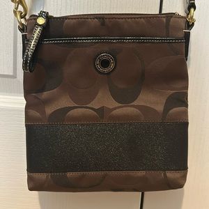 Brown and black Coach crossbody